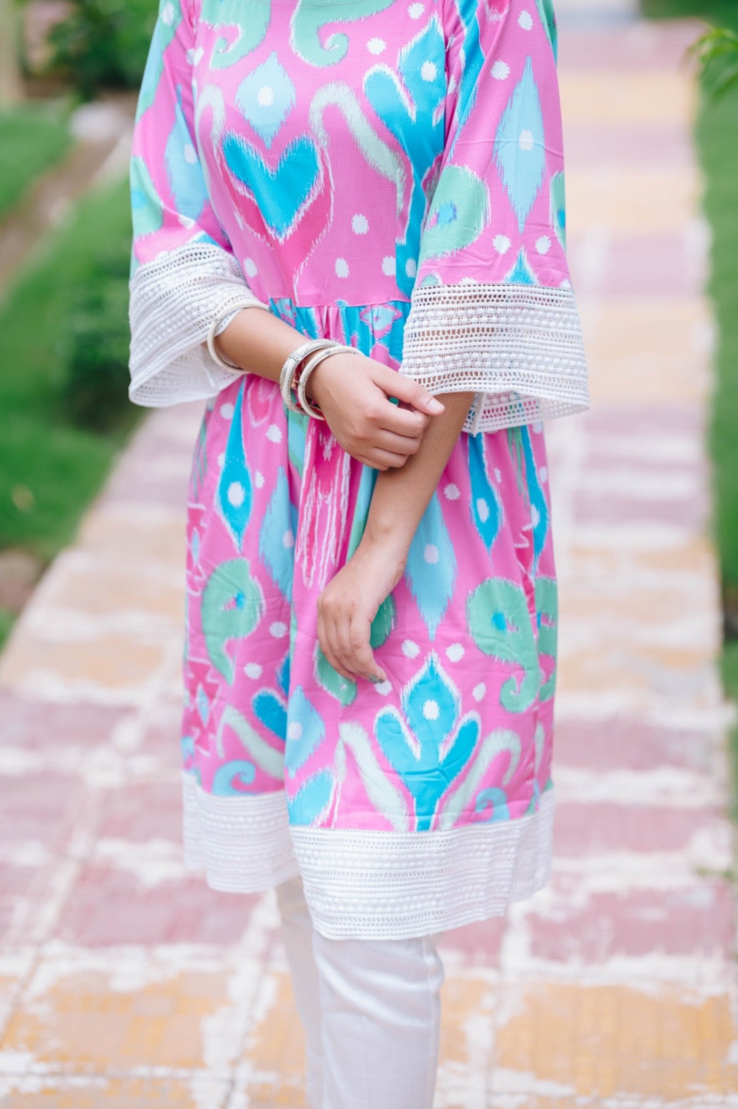 BABY PINK FROCK STYLE KURTI + MULTICOLOURED FLOWERED KURTI